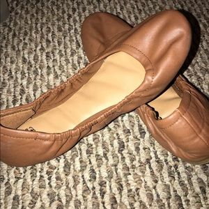 Tan ballet flats